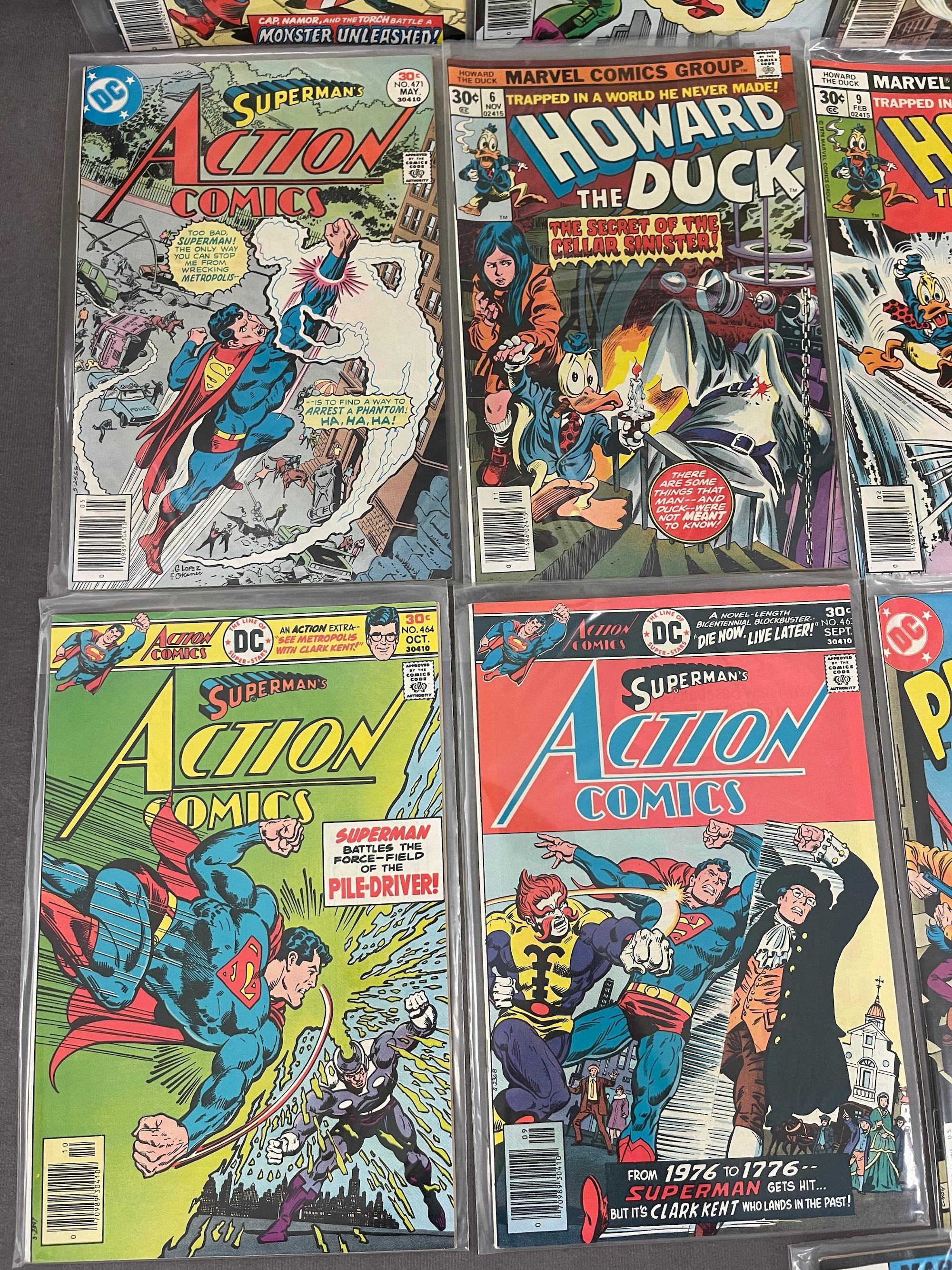 VINTAGE COMIC BOOK COLLECTION INVADERS HOWARD DUCK ACTION COMICS DC AND MARVEL COMICS LOT 20