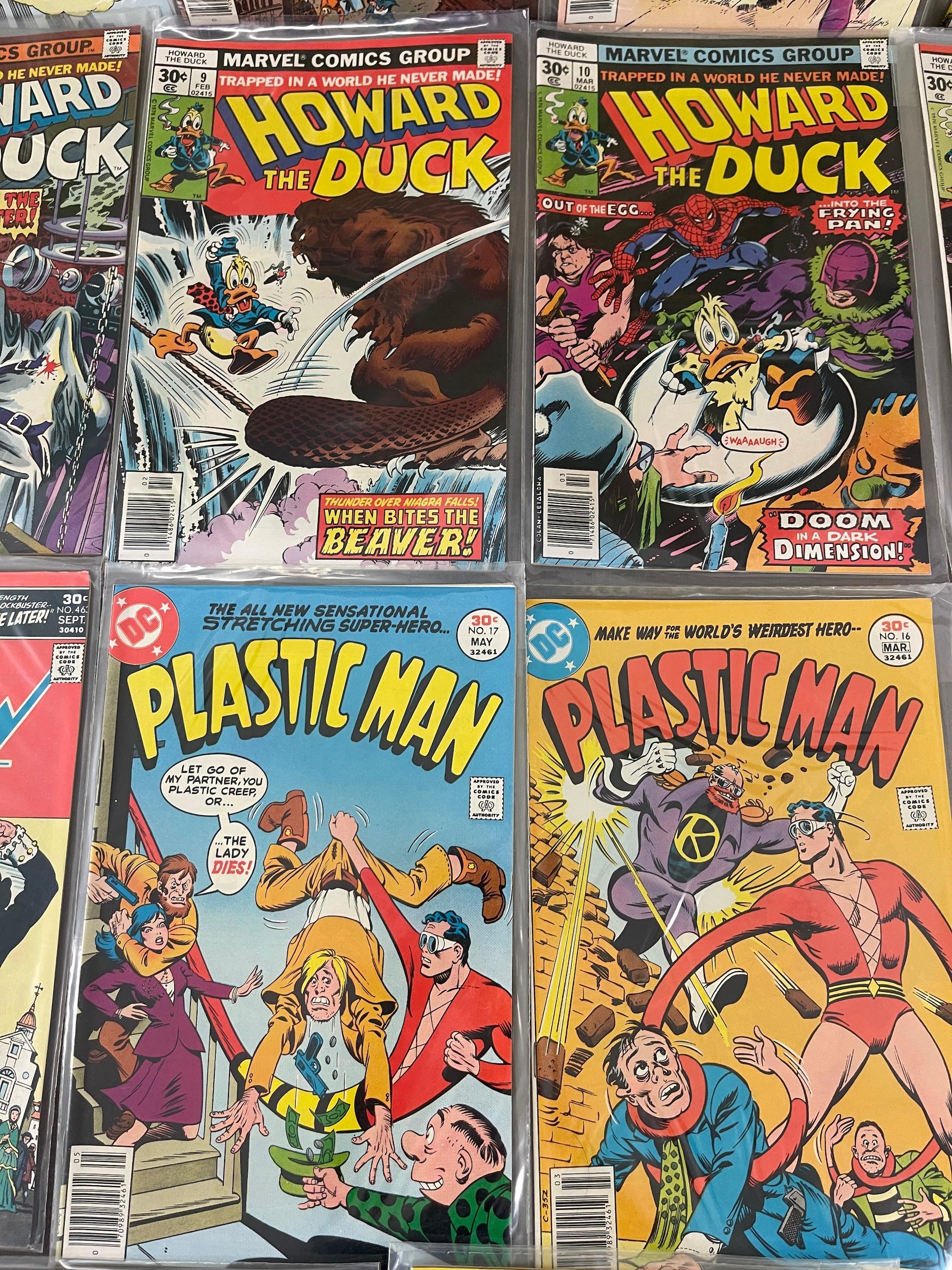 VINTAGE COMIC BOOK COLLECTION INVADERS HOWARD DUCK ACTION COMICS DC AND MARVEL COMICS LOT 20