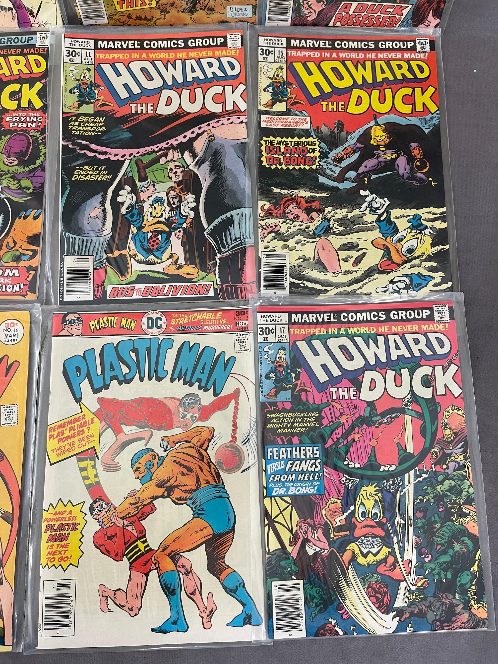 VINTAGE COMIC BOOK COLLECTION INVADERS HOWARD DUCK ACTION COMICS DC AND MARVEL COMICS LOT 20