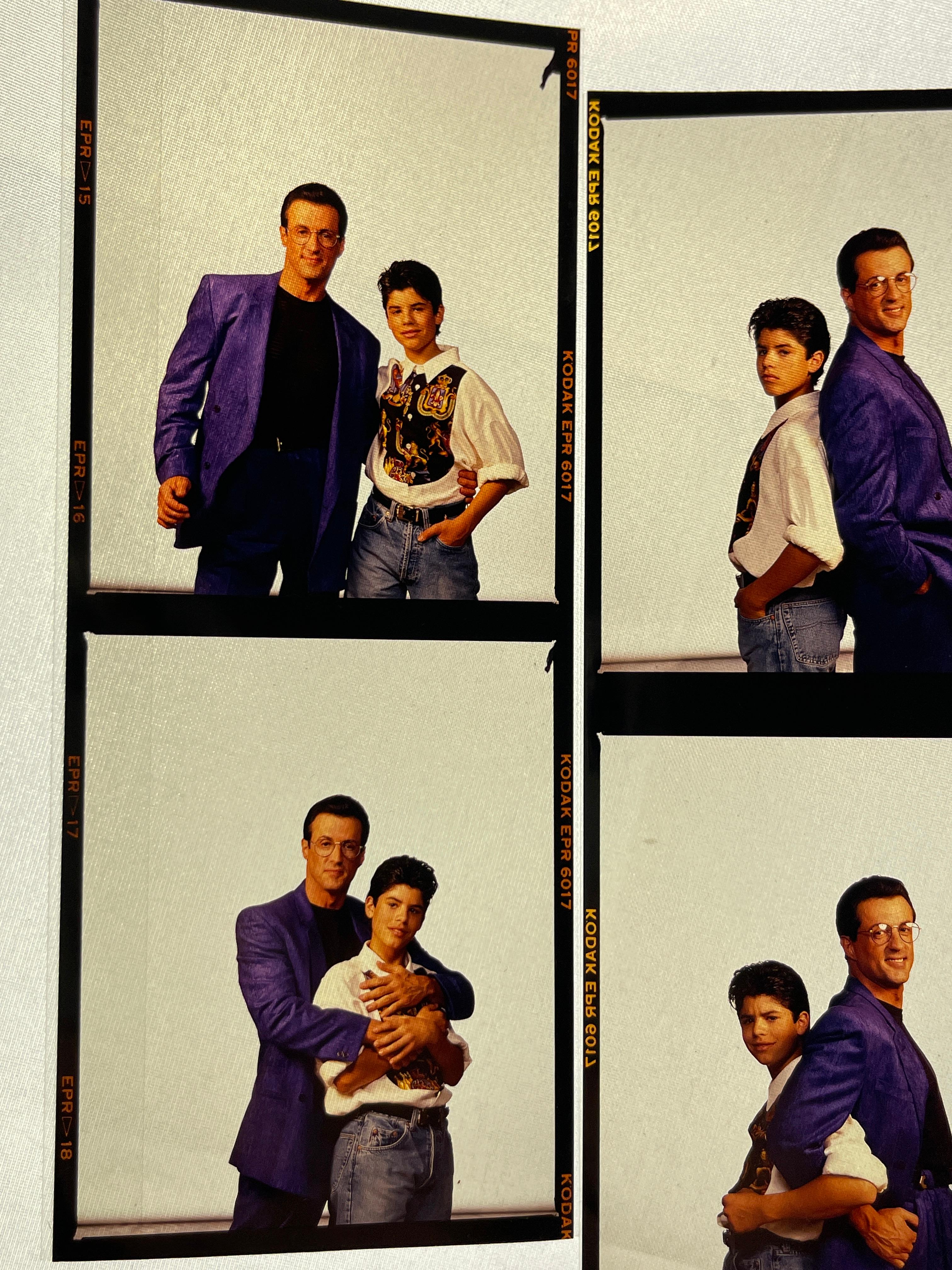 COLOR PHOTO NEGATIVE SYLVESTER STALLONE AND HIS SON