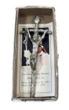 Metal crucifix in box