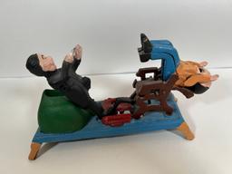 VINTAGE CAST IRON TOY BANK - DENTIST PULLING TEETH