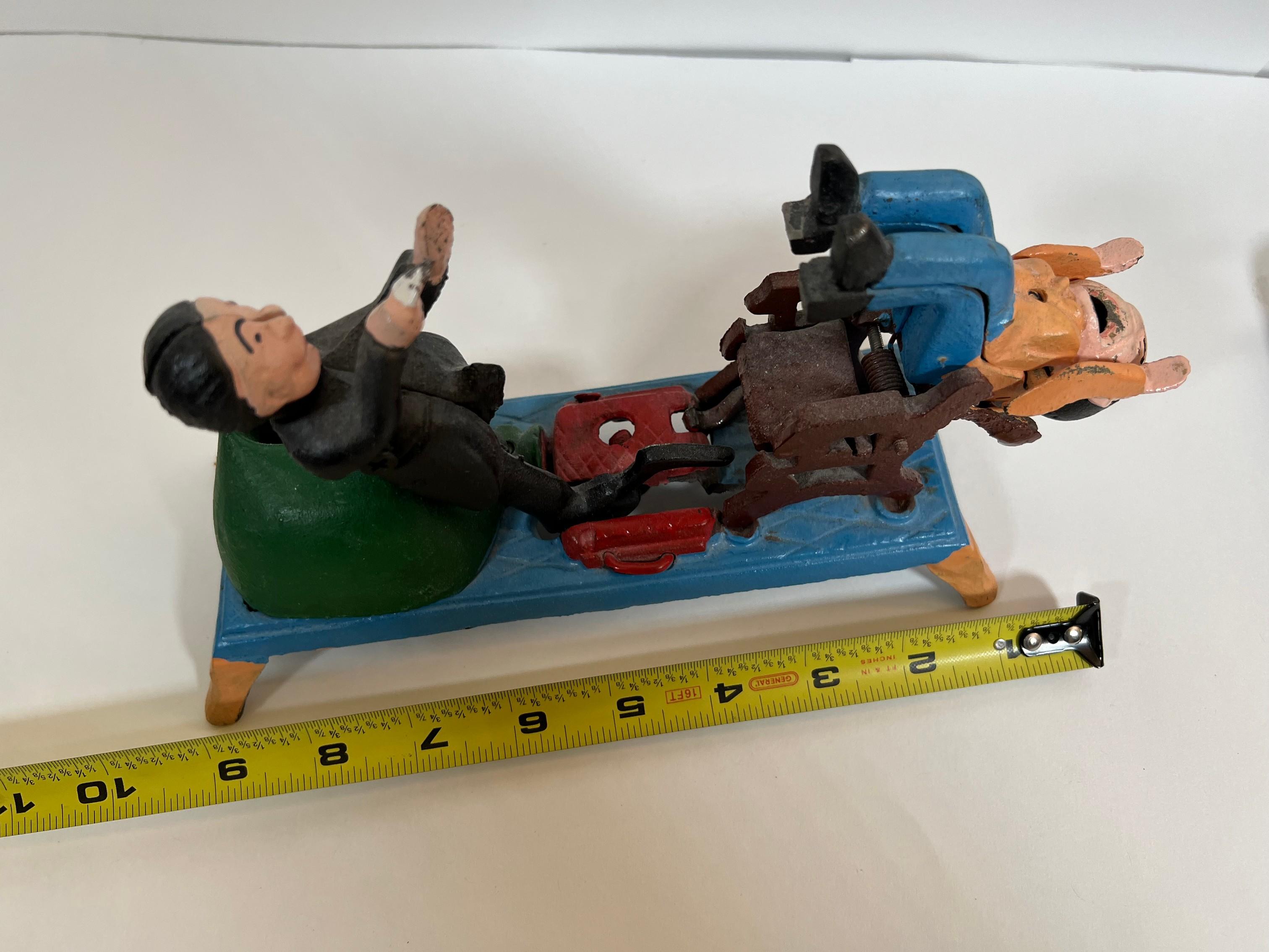 VINTAGE CAST IRON TOY BANK - DENTIST PULLING TEETH