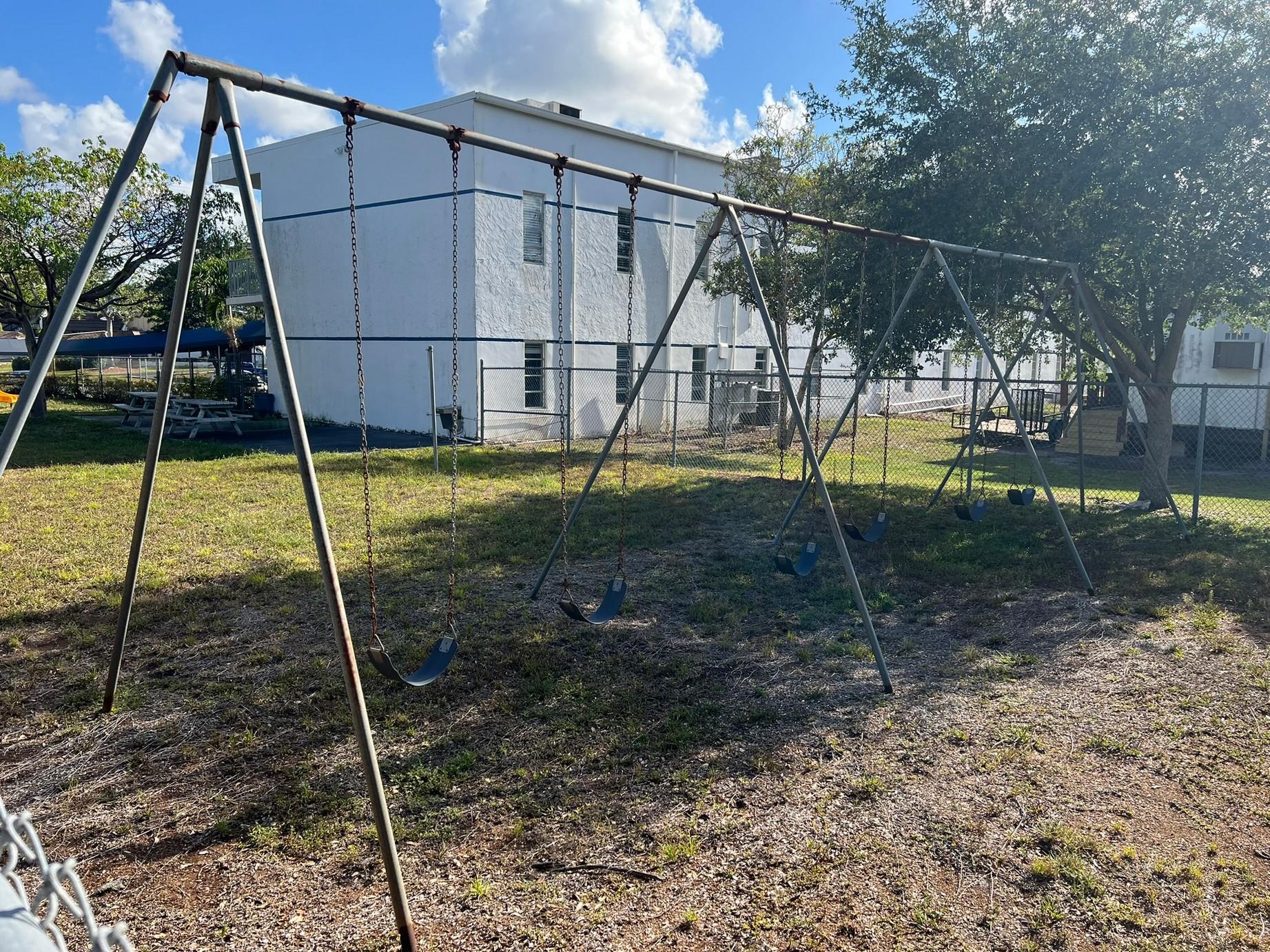 SWING SET (6 SWINGS) & LARGE PLAYSET (WITH SLIDES, LADDERS, & MORE (LOCATED