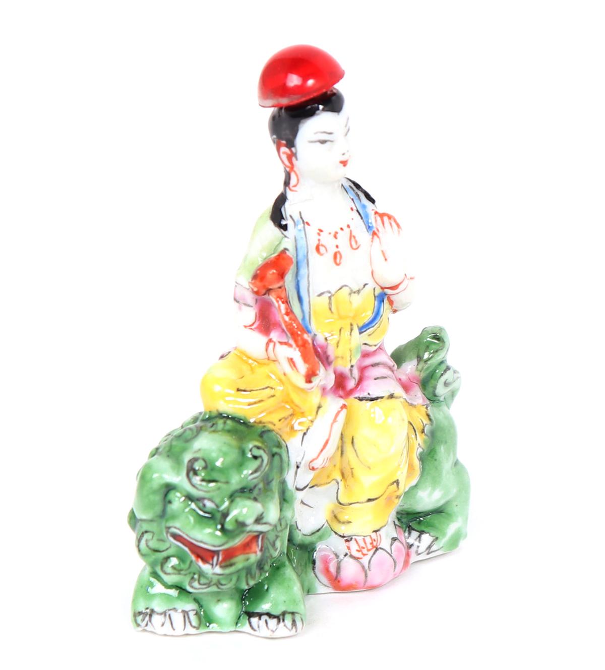 Chinese Porcelain Guan Yin on a Lion Snuff Bottle