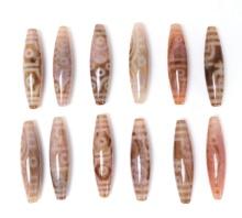 12 Gorgeous Tibetan Dzi Beads