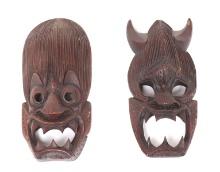 Two Wood Carved Tibetan Transformation Masks
