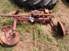 Farmall A front axle with wheel weights