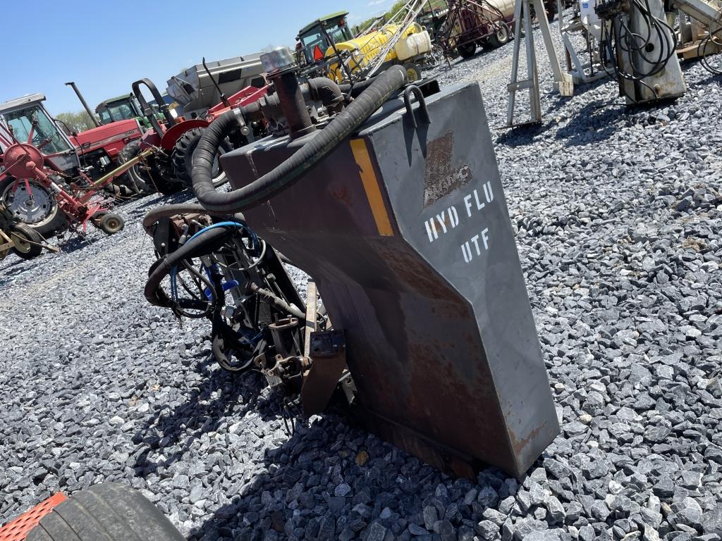 Hydraulic tank attaches to tractor