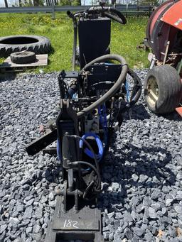 Hydraulic tank attaches to tractor