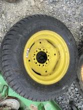 (1) Carlisle 27x10.50-15 Tire on 12 Lug Rim