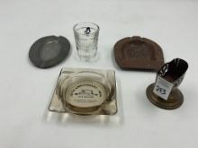 5 misc - metal horseshoe good luck - match book holder - playboy shot glass - les potstainiers - cp-