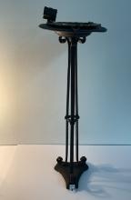 Wrought iron coin smoking stand