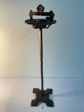 1920s iron ornate smoking stand