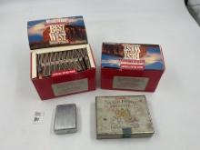 4 camel lighters - 1 box filters - cigarette holder - 1 deck playing cards