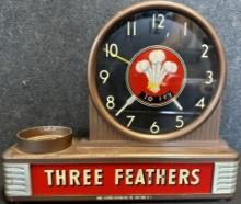 1930s Art Deco Three Feathers Whiskey Lighted Motion Counter Top Advertising Display Clock