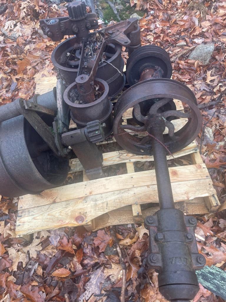 SAW MILL PARTS AND PULLEYS (2 SKIDS)