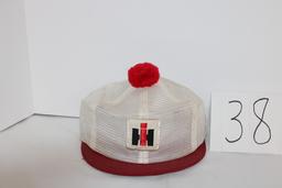 IH Ladies mesh hat with red pom pom and visor