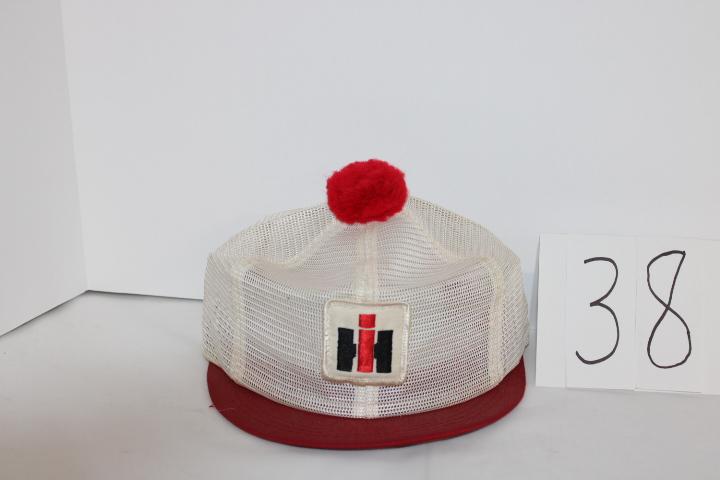 IH Ladies mesh hat with red pom pom and visor