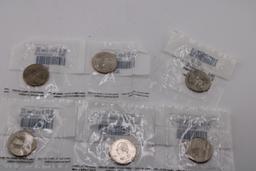 Six Uncirculated Sealed Quarters