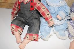 Lot of four Large Porcelain Dolls