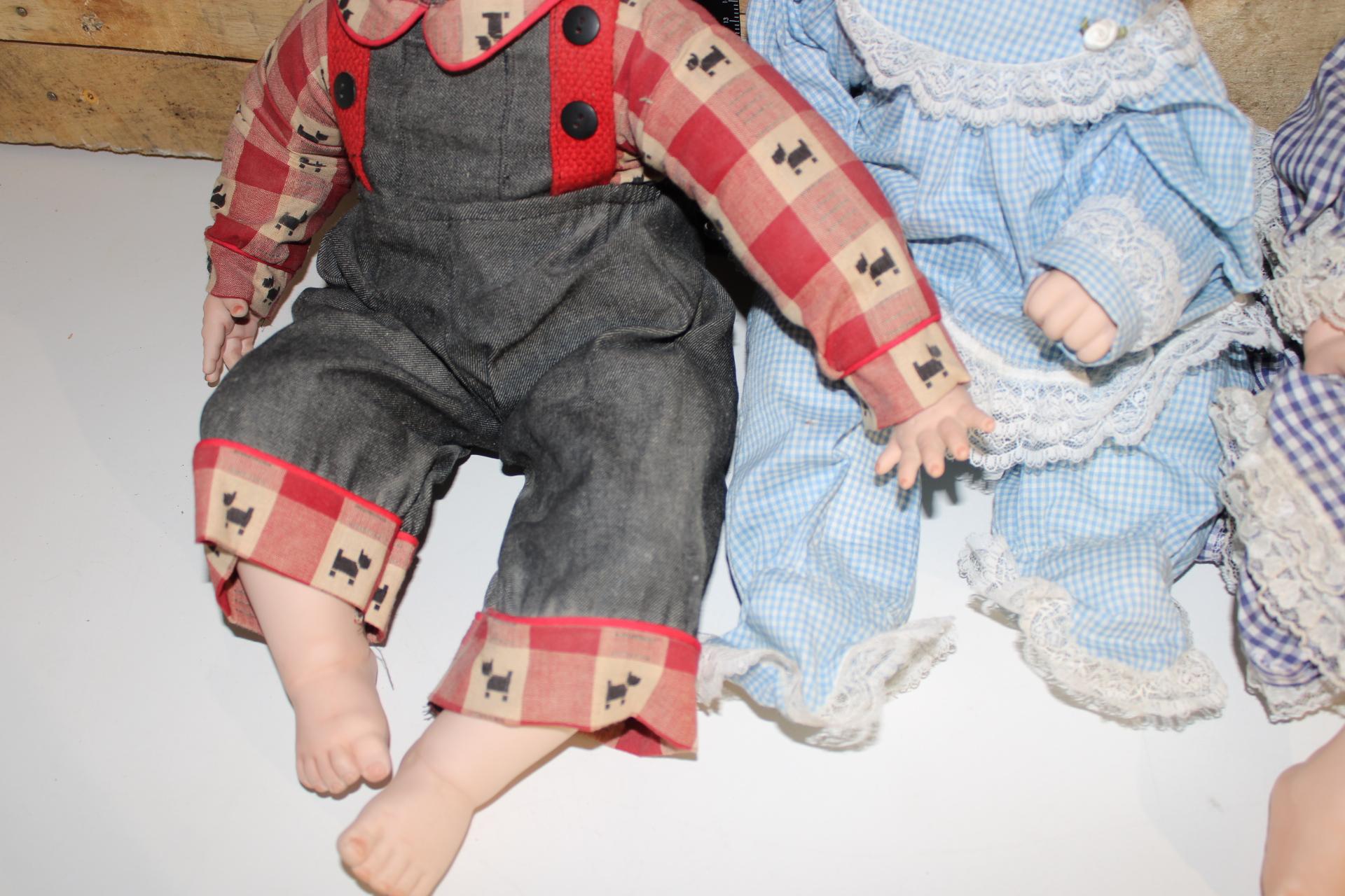 Lot of four Large Porcelain Dolls