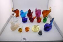 Sixteen Glass Figurines.