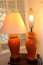 Pair of Orange Ceramic Lamps.