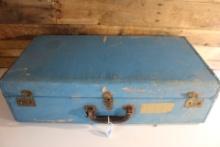 Vintage Suitcase and childrens clothing.