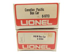 Lot of 2 NIB Lionel Train Box Cars - Canadian Pacific, N&W