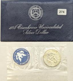 1974 Silver Blue Ike Dollar with Official Blue Envelope and Token From the Department of Treasury