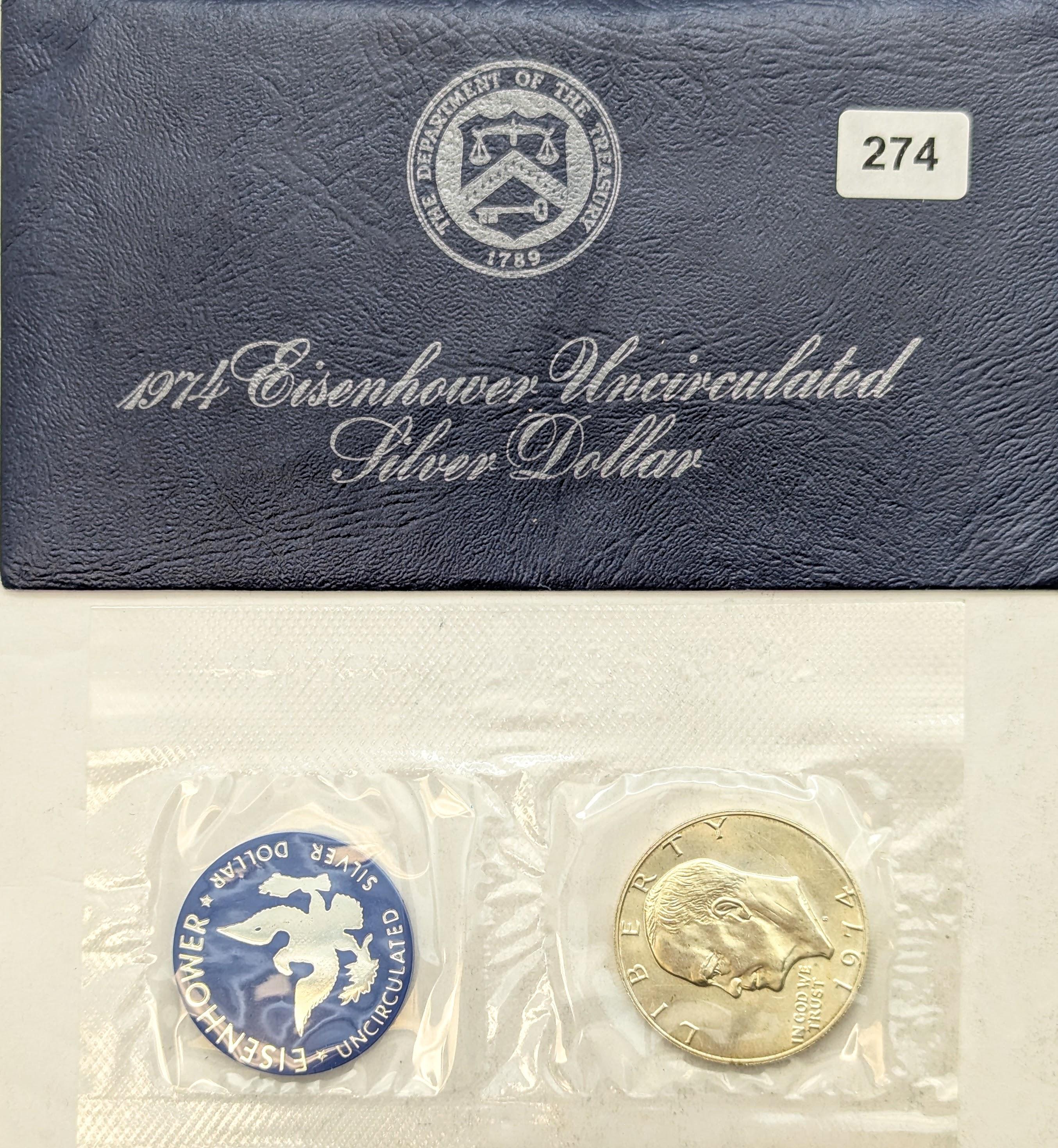 1974 Silver Blue Ike Dollar with Official Blue Envelope and Token From the Department of Treasury