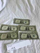 Group of five series 1957 One Dollar Silver Certificates BLUE SEAL