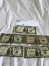 Group of five series 1935 One Dollar Silver Certificates BLUE SEAL