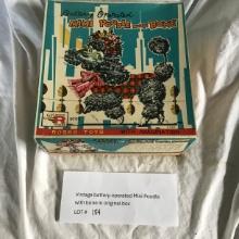 Vintage battery operated Mini Poodle with bone in original box
