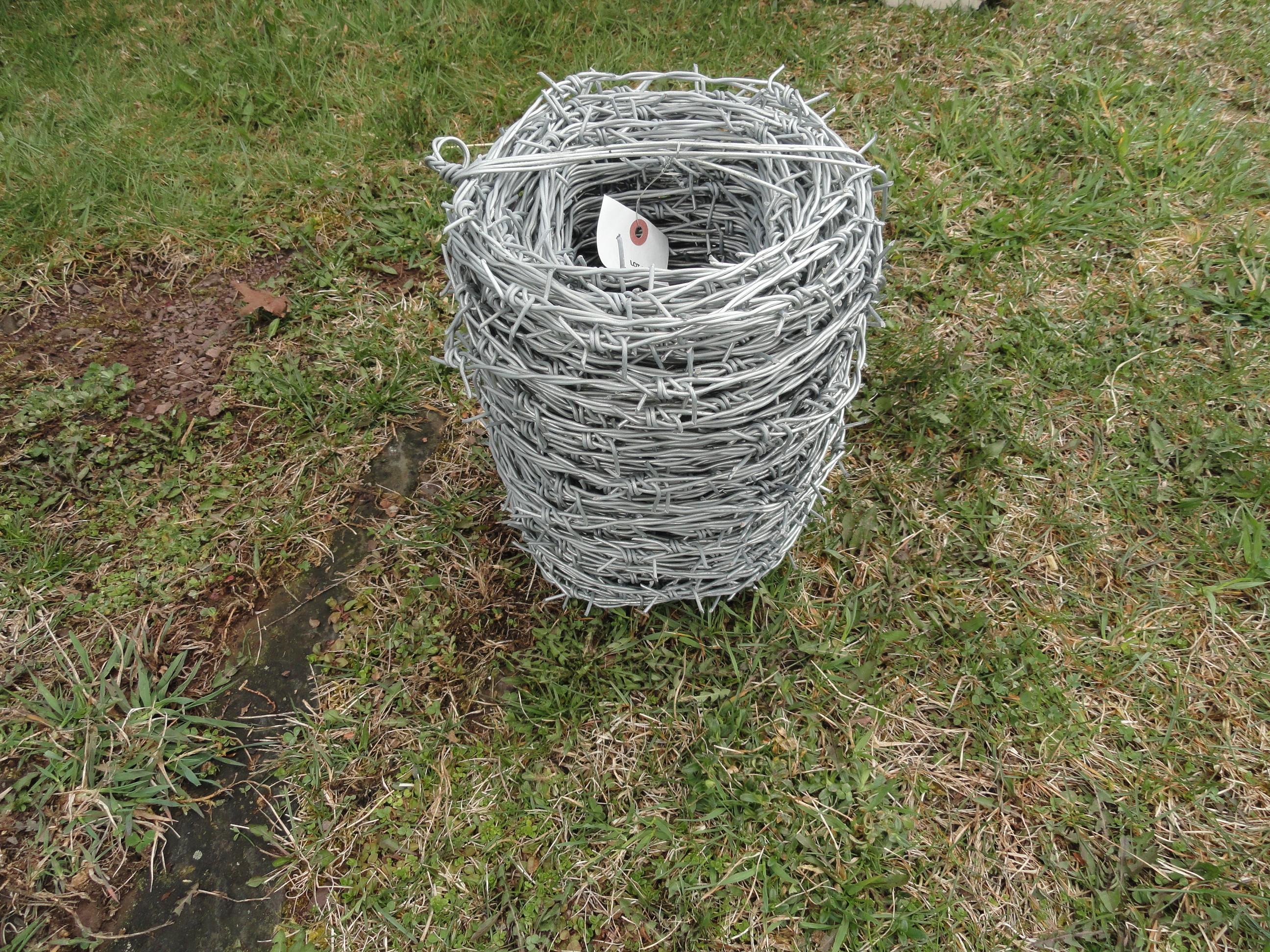 New galvanized barb wire