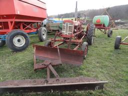 Farmall tractor with snow plow, back blade and 2btm plow