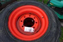 Set of 4 12-16.5 skidsteer tires on Bobcat rims