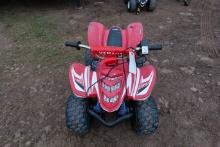 Red Yamaha kids power wheel ATV