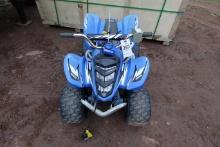 Blue Yamaha kids power wheel ATV