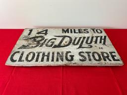 Big Duluth Clothes Wood Road Sign