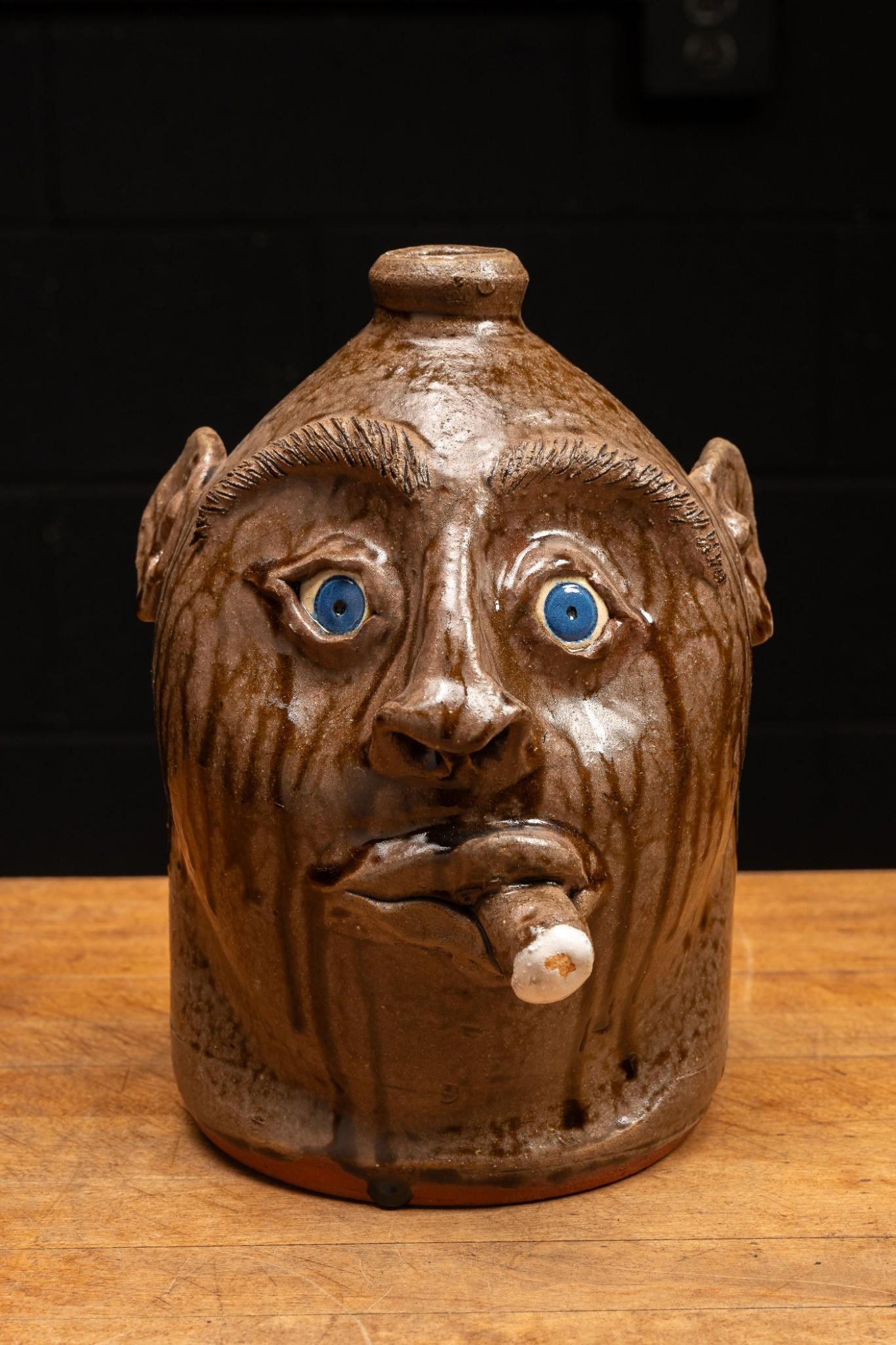 Glazeware Face Jug with Cigar and Blue Eyes by Mike Craven