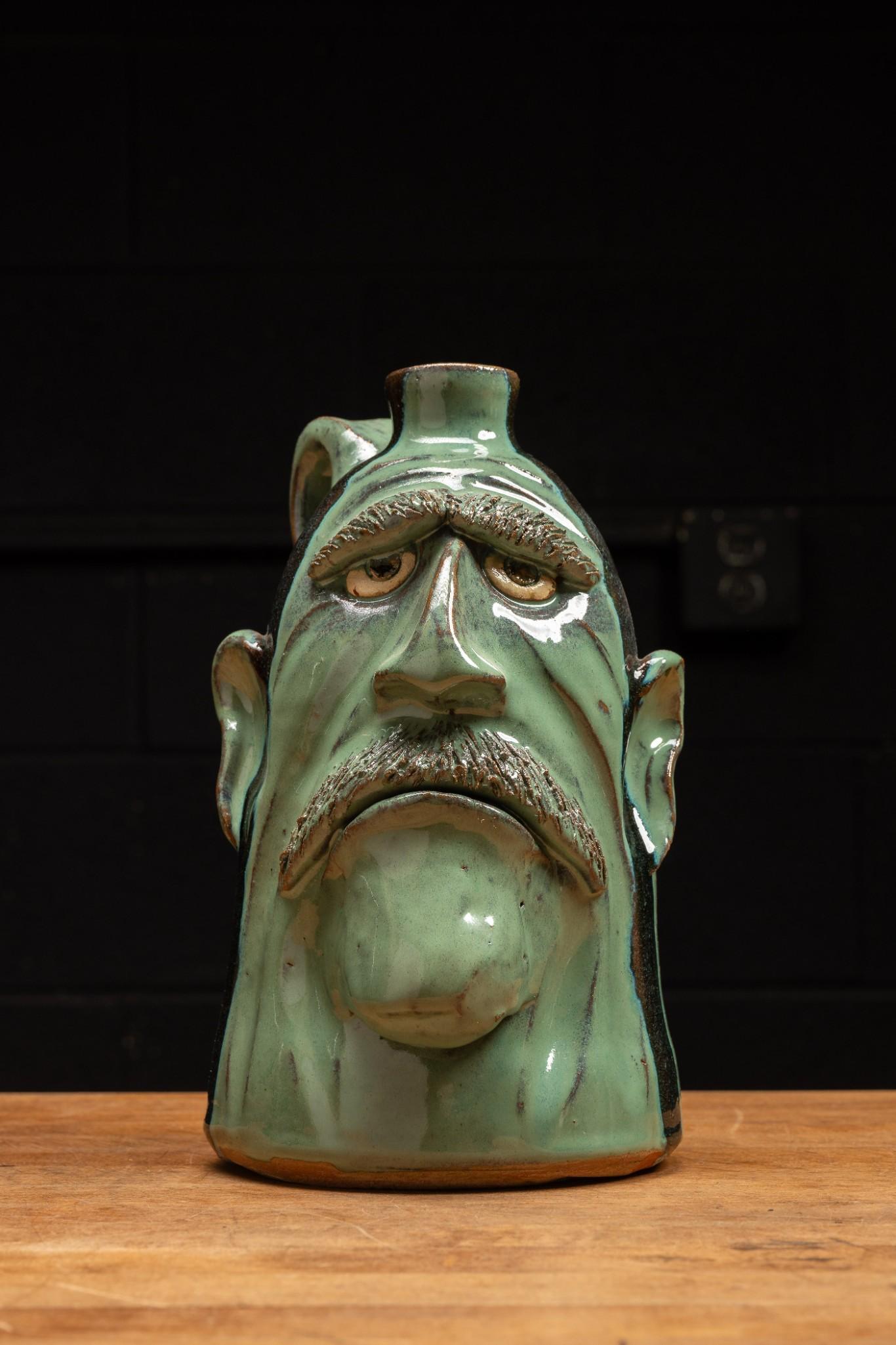 Green Glazeware Face Jug with Mustache by Dal Burtchaell