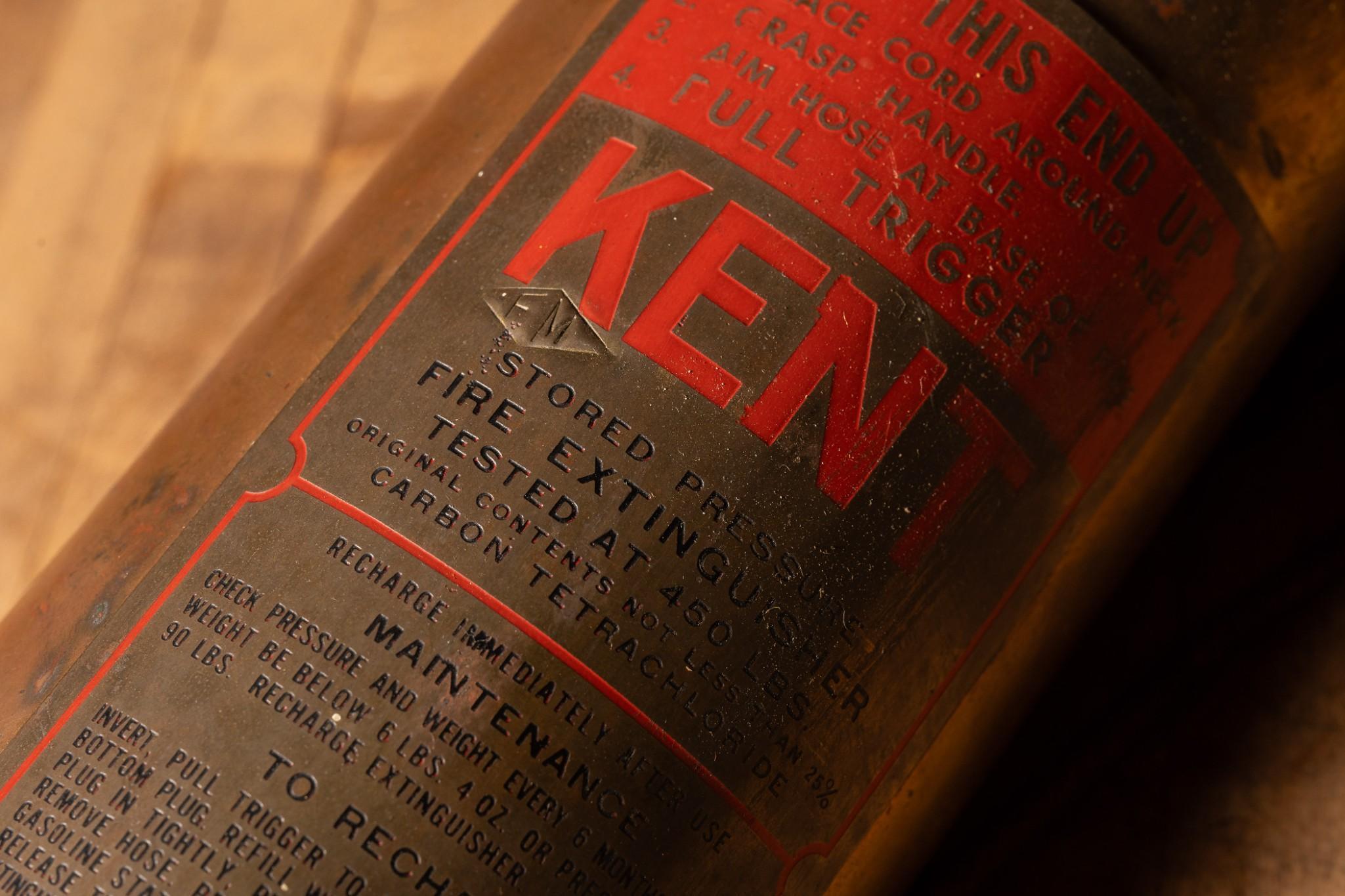 Antique Fire Extinguisher by Kent