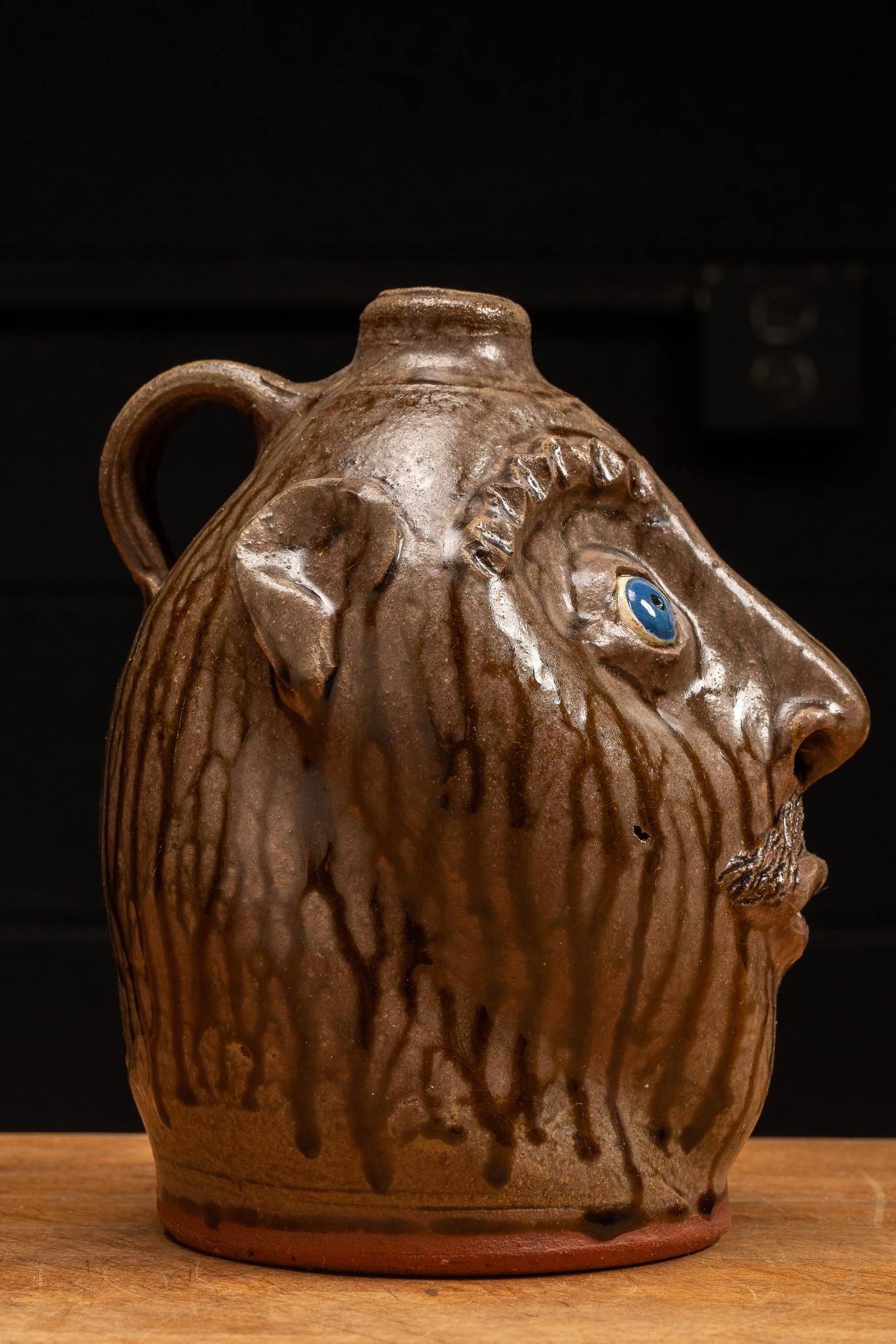 Brown Glazeware Face Jug with Blue Eyes by Mike Craven