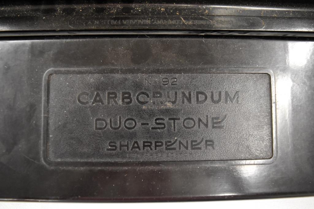Carborundum duo-stone sharpener in plastic case
