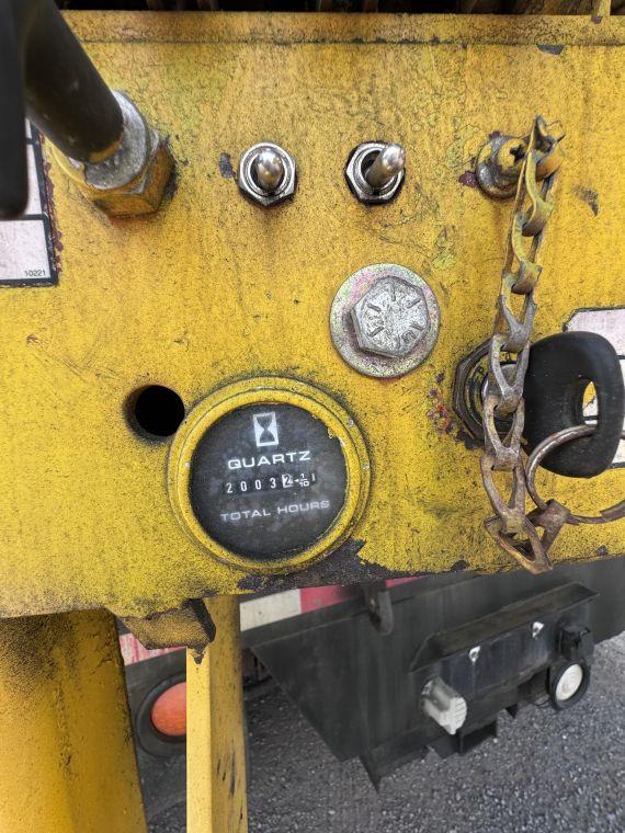 1996 International 4700 with Sterling Guard Rail Post Driver.