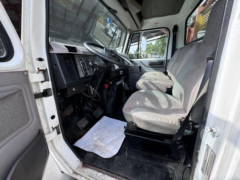 1996 International 4700 with Sterling Guard Rail Post Driver.