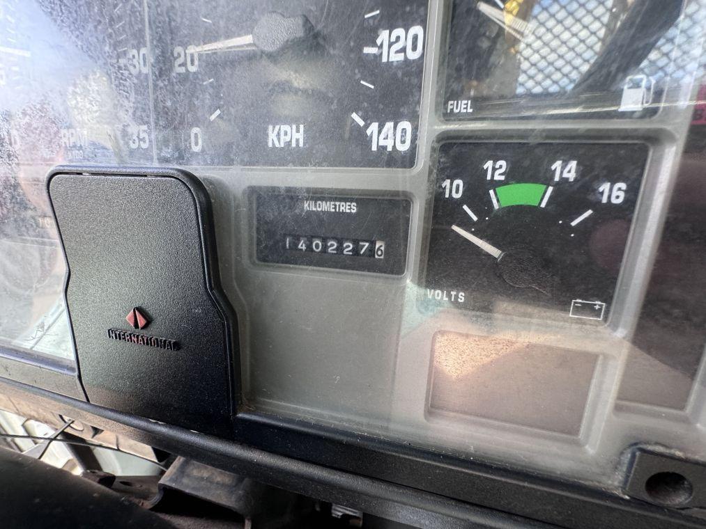 1996 International 4700 with Sterling Guard Rail Post Driver.