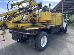 1996 International 4700 with Sterling Guard Rail Post Driver.